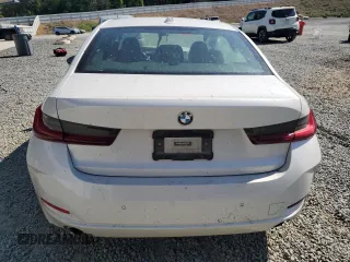 2023 BMW 3 Series 330i with VIN 3MW69FF0XP8D11989, listed as a Copart auction lot 54896825 with Not provided miles and Salvage title. Bid and sale history available at DreamBid. Image 6.