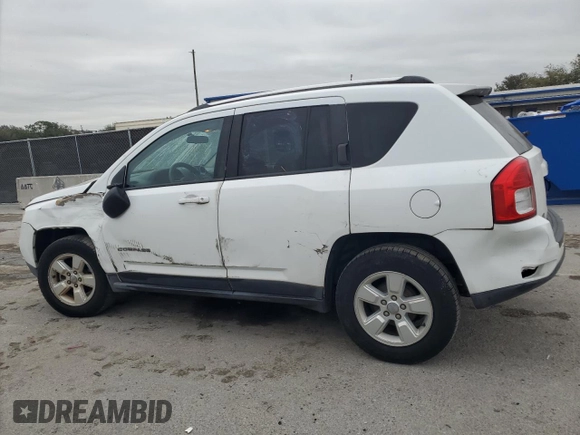 2013 Jeep Compass Sport with VIN 1C4NJCBA4DD115709, listed as a Copart auction lot 88408875 with 241,259 mi miles and Salvage Title. Bid and sale history available at carsss.com. Image 2.