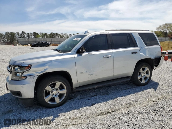 2015 Chevrolet Tahoe LT with VIN 1GNSCBKC9FR741455, listed as a Copart auction lot 50526445 with 157,252 mi miles and Salvage Title. Bid and sale history available at DreamBid. Image 1.