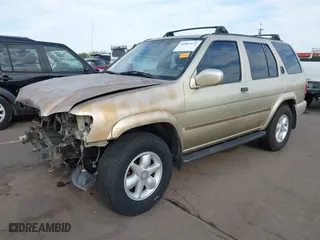 2000 Nissan Pathfinder XE with VIN JN8AR07S0YW417987, listed as a IAAI auction lot 41883473 with 223,721 mi miles. Bid and sale history available at carsss.com. Image 2.