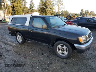 1998 Nissan Frontier XE with VIN 1N6DD21S7WC347623, listed as a Copart auction lot 45347025 with 176,093 mi miles and Salvage title. Bid and sale history available at DreamBid. Image 4.