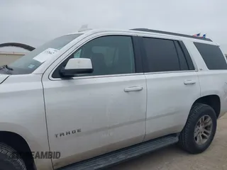 2015 Chevrolet Tahoe LS with VIN 1GNSCAEC2FR641252, listed as a IAAI auction lot 41528667 with 183,796 mi miles and . Bid and sale history available at DreamBid. Image 14.