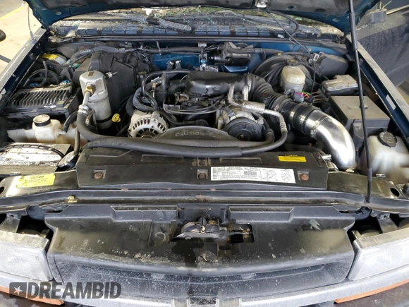 2000 Chevrolet Blazer LS z VIN 1GNCT18WXYK132399, wystawiony jako Copart lot #87880555 z przebiegiem 89 350 mil mil oraz Czysty tytuł • Clean title. Historia ofert i sprzedaży dostępna na DreamBid. Obrazek 13.