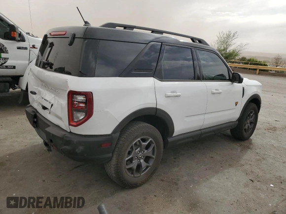 2021 Ford Bronco Sport Badlands z VIN 3FMCR9D96MRA87307, wystawiony jako Copart lot #53701625 z przebiegiem 27 744 mil mil oraz Szkoda całkowita • Salvage title. Historia ofert i sprzedaży dostępna na DreamBid. Obrazek 3.