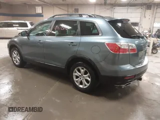 2012 Mazda CX-9 Touring z VIN JM3TB3CV8C0358099, wystawiony jako IAAI lot #41478110 z przebiegiem 151 716 mil mil oraz . Historia ofert i sprzedaży dostępna na DreamBid. Obrazek 3.