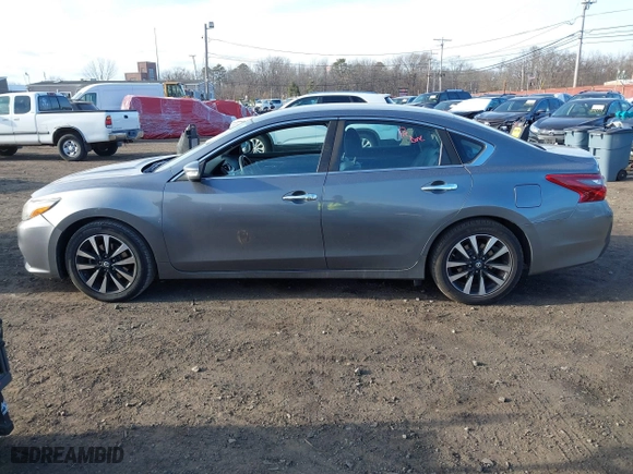 2018 Nissan Altima 2.5 SV with VIN 1N4AL3AP9JC166273, listed as a IAAI auction lot 41694295 with 83,864 mi miles. Bid and sale history available at carsss.com. Image 14.