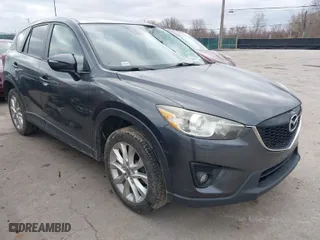2015 Mazda CX-5 Grand Touring with VIN JM3KE4DY0F0479229, listed as a IAAI auction lot 41838381 with NaN miles. Bid and sale history available at carsss.com. Image 1.