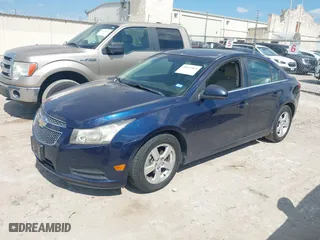 2011 Chevrolet Cruze LT w/2LT with VIN 1G1PG5S96B7160034, listed as a IAAI auction lot 40545865 with 114,801 mi miles. Bid and sale history available at carsss.com. Image 2.