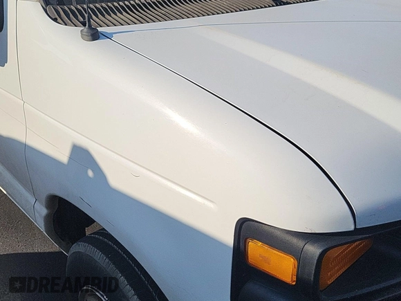 2013 Ford Econoline Cargo Commercial z VIN 1FTNE1EW1DDA61995, wystawiony jako IAAI lot #42516622 z przebiegiem 182 503 mil mil oraz . Historia ofert i sprzedaży dostępna na DreamBid. Obrazek 31.