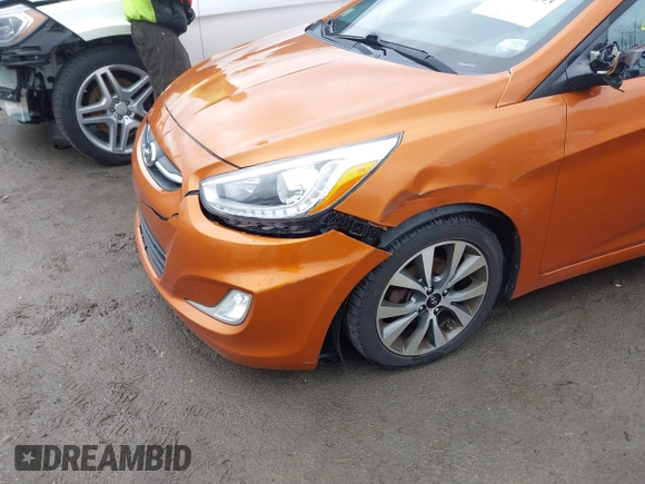 2015 Hyundai Accent Sport with VIN KMHCU5AE3FU205849, listed as a IAAI auction lot 41827093 with 112,980 mi miles. Bid and sale history available at carsss.com. Image 6.