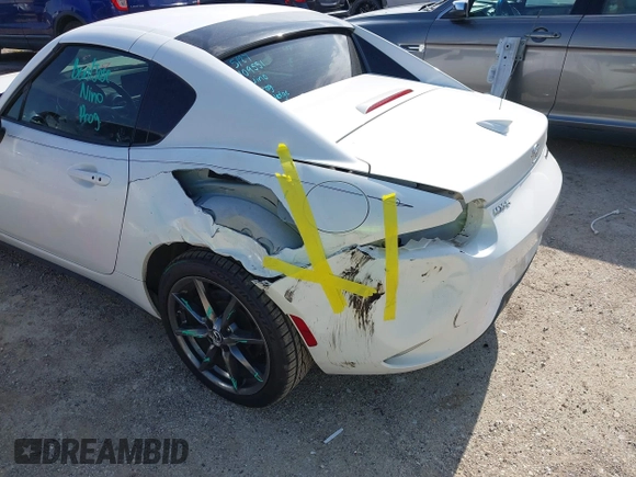 2020 Mazda MX-5 Miata Grand Touring с VIN JM1NDAM73L0414658, выставлен на аукционе IAAI как лот 42451595 с пробегом 73 339 миль миль и . История ставок и продаж доступна на DreamBid. Изображение 6.