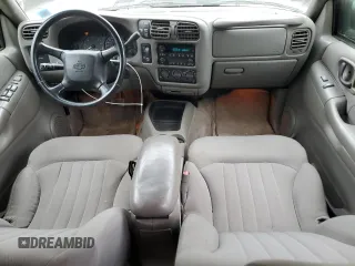2004 Chevrolet Blazer LS z VIN 1GNDT13X84K162807, wystawiony jako Copart lot #57154205 z przebiegiem 82 732 mil mil oraz Czysty tytuł • Clean title. Historia ofert i sprzedaży dostępna na DreamBid. Obrazek 8.
