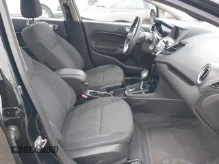 2016 Ford Fiesta SE z VIN 3FADP4BJ6GM107996, wystawiony jako IAAI lot #42433173 z przebiegiem 61 302 mil mil oraz . Historia ofert i sprzedaży dostępna na DreamBid. Obrazek 5.