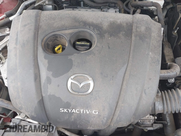 2019 Mazda 3 Preferred z VIN JM1BPAMM2K1135386, wystawiony jako IAAI lot #40367062 z przebiegiem 9 999 mil mil oraz . Historia ofert i sprzedaży dostępna na DreamBid. Obrazek 10.