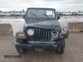 2004 Jeep Wrangler X with VIN 1J4FA39S34P753865, listed as a IAAI auction lot 41948545 with 198,169 mi miles. Bid and sale history available at carsss.com. Image 12.