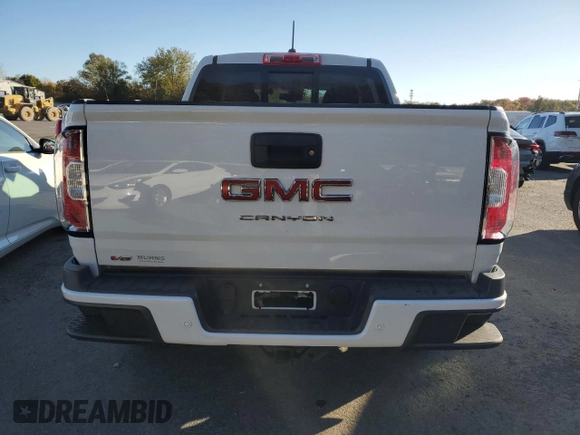 2021 GMC Canyon 4WD Elevation with VIN 1GTG6CEN4M1255429, listed as a Copart auction lot 75217524 with 21,958 mi miles and Salvage Title. Bid and sale history available at carsss.com. Image 6.