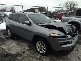 2017 Jeep Cherokee Latitude with VIN 1C4PJMCS8HW649473, listed as a IAAI auction lot 41665032 with 107,499 mi miles. Bid and sale history available at carsss.com. Image 1.