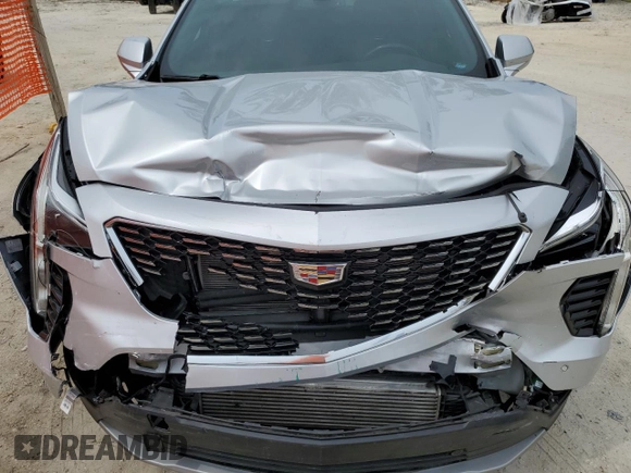 2019 Cadillac XT4 FWD Premium Luxury z VIN 1GYFZCR44KF195554, wystawiony jako Copart lot #55728095 z przebiegiem 35 948 mil mil oraz Nie do naprawy. Historia ofert i sprzedaży dostępna na DreamBid. Obrazek 12.