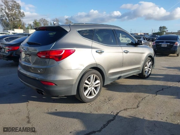 2014 Hyundai Santa Fe Sport with VIN 5XYZU3LA8EG185627, listed as a IAAI auction lot 41592463 with NaN miles. Bid and sale history available at carsss.com. Image 4.