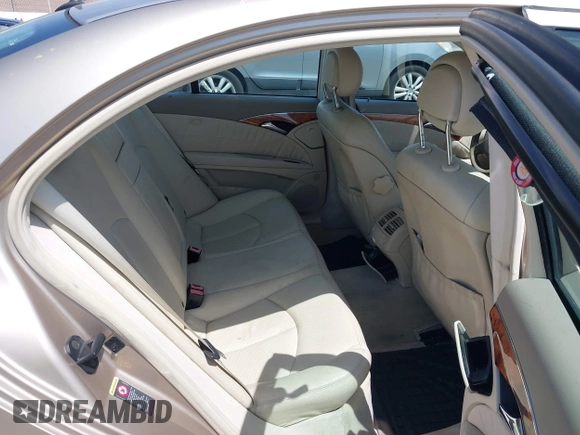 2003 Mercedes-Benz E-Class 3.2L with VIN WDBUF65JX3A236768, listed as a IAAI auction lot 42094824 with 251,896 mi miles. Bid and sale history available at carsss.com. Image 8.