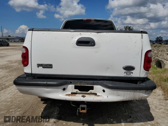 2001 Ford F-150 XL with VIN 1FTRX07L81KF40897, listed as a Copart auction lot 73887094 with 0 mi miles and Salvage Title. Bid and sale history available at carsss.com. Image 6.