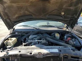 2001 Dodge 2500 z VIN 1B7KF23W71J542954, wystawiony jako Copart lot #55684025 z przebiegiem 172 811 mil mil oraz Szkody całkowita. Historia ofert i sprzedaży dostępna na DreamBid. Obrazek 11.