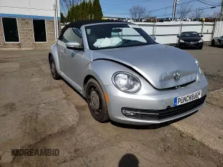 2013 Volkswagen Beetle 2.5L with VIN 3VW5P7AT0DM821280, listed as a Copart auction lot 53565635 with 94,969 mi miles and Salvage Title. Bid and sale history available at DreamBid. Image 14.