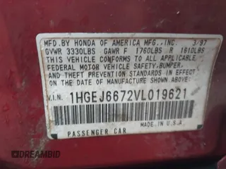 1997 Honda Civic LX with VIN 1HGEJ6672VL019621, listed as a IAAI auction lot 42081226 with 194,957 mi miles. Bid and sale history available at carsss.com. Image 9.