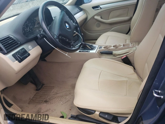 2002 BMW 3 Series 325xi with VIN WBAEU33402PF71539, listed as a Copart auction lot 58396995 with 154,644 mi miles and Salvage title. Bid and sale history available at DreamBid. Image 7.