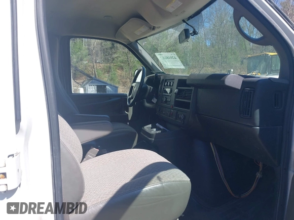 2015 Chevrolet Express Cargo Van with VIN 1GCWGFCF9F1167677, listed as a IAAI auction lot 42018087 with 148,263 mi miles. Bid and sale history available at carsss.com. Image 5.