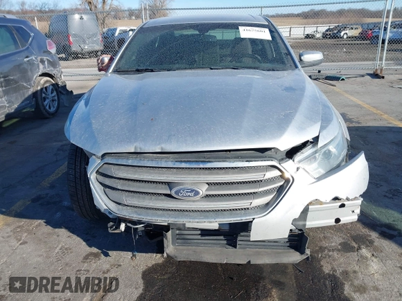 2013 Ford Taurus SEL with VIN 1FAHP2E83DG224780, listed as a IAAI auction lot 41675601 with 166,977 mi miles. Bid and sale history available at carsss.com. Image 12.