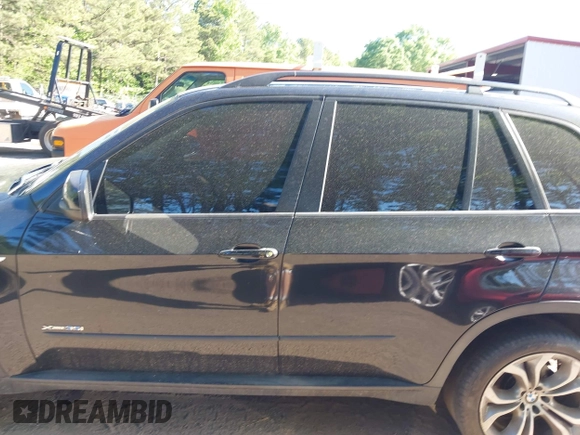 2012 BMW X5 35i z VIN 5UXZV4C5XCL744343, wystawiony jako IAAI lot #42134441 z przebiegiem 136 984 mil mil oraz . Historia ofert i sprzedaży dostępna na DreamBid. Obrazek 14.