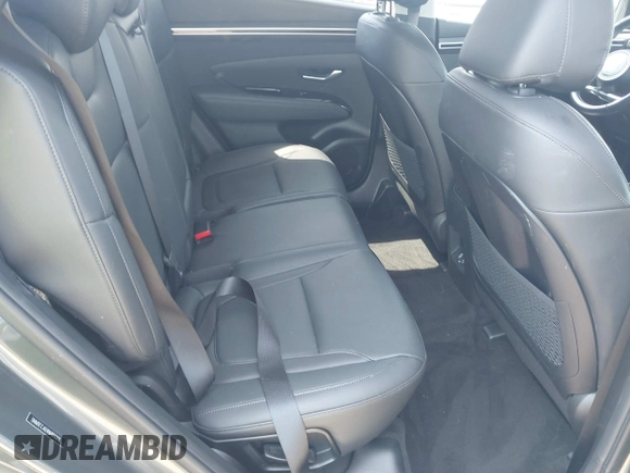 2022 Hyundai Tucson SEL z VIN 5NMJCCAE4NH096813, wystawiony jako IAAI lot #41899641 z przebiegiem 23 668 mil mil oraz . Historia ofert i sprzedaży dostępna na DreamBid. Obrazek 8.