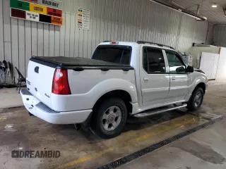 2004 Ford Explorer Sport Trac XLS with VIN 1FMZU77K74UB23543, listed as a Copart auction lot 62859625 with 96,873 mi miles and Salvage title. Bid and sale history available at DreamBid. Image 3.