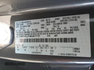 2021 Ford Escape Titanium Plug-In Hybrid z VIN 1FMCU0LZ1MUB17737, wystawiony jako Copart lot #57162592 z przebiegiem Nie podano mil oraz . Historia ofert i sprzedaży dostępna na DreamBid. Obrazek 10.