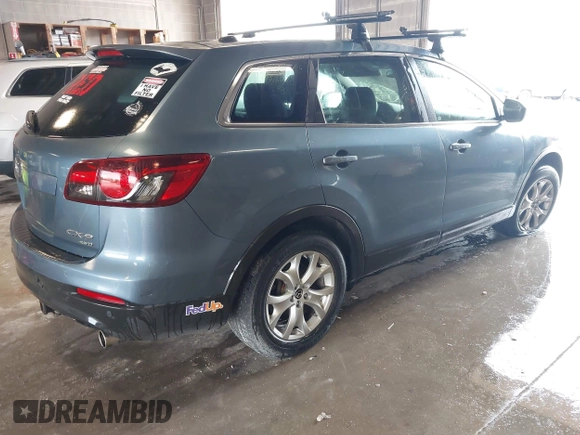 2014 Mazda CX-9 Touring with VIN JM3TB3CA0E0447066, listed as a IAAI auction lot 42350587 with 162,707 mi miles and . Bid and sale history available at DreamBid. Image 4.