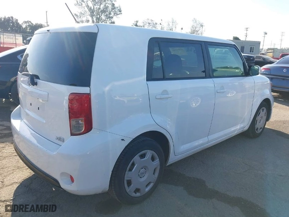 2014 Scion xB with VIN JTLZE4FE0EJ048932, listed as a IAAI auction lot 41992285 with 129,567 mi miles. Bid and sale history available at carsss.com. Image 4.