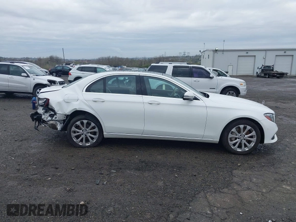2017 Mercedes-Benz E E 300 Luxury with VIN WDDZF4KBXHA108620, listed as a IAAI auction lot 41935260 with 81,684 mi miles. Bid and sale history available at carsss.com. Image 13.