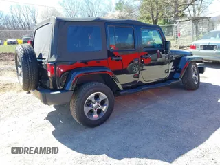 2017 Jeep Wrangler Unlimited Sahara with VIN 1C4BJWEG4HL605843, listed as a IAAI auction lot 41883085 with 93,752 mi miles. Bid and sale history available at carsss.com. Image 4.