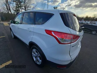 2015 Ford Escape SE with VIN 1FMCU9GX9FUB13662, listed as a IAAI auction lot 42279727 with 73,742 mi miles and . Bid and sale history available at DreamBid. Image 21.