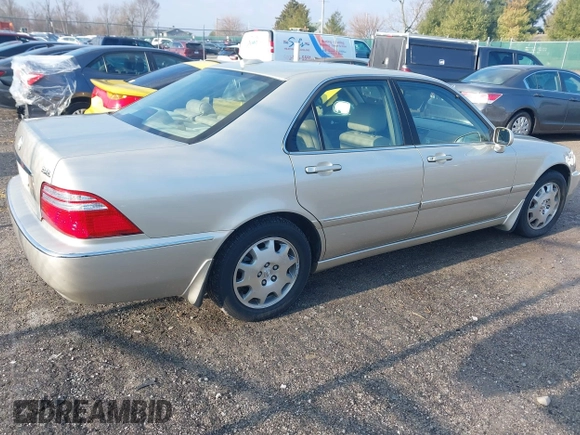 2004 Acura RL w/Navigation System z VIN JH4KA96664C001291, wystawiony jako IAAI lot #41678449 z przebiegiem 83 954 mil mil oraz . Historia ofert i sprzedaży dostępna na DreamBid. Obrazek 4.