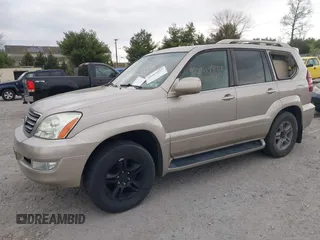 2003 Lexus GX 470 z VIN JTJBT20X230003105, wystawiony jako IAAI lot #42063855 z przebiegiem 204 004 mil mil oraz . Historia ofert i sprzedaży dostępna na DreamBid. Obrazek 2.