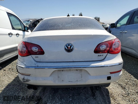 2011 Volkswagen CC Sport z VIN WVWMP7AN5BE707763, wystawiony jako Copart lot #52054875 z przebiegiem 115 496 mil mil oraz Szkoda całkowita • Salvage title. Historia ofert i sprzedaży dostępna na DreamBid. Obrazek 6.
