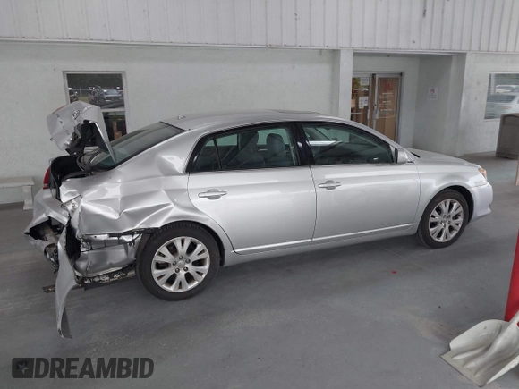 2009 Toyota Avalon XL with VIN 4T1BK36B69U341854, listed as a IAAI auction lot 41727553 with 102,369 mi miles. Bid and sale history available at carsss.com. Image 13.