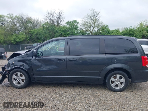 2012 Dodge Grand Caravan SXT with VIN 2C4RDGCG7CR236328, listed as a IAAI auction lot 42170991 with 72,831 mi miles and . Bid and sale history available at DreamBid. Image 15.
