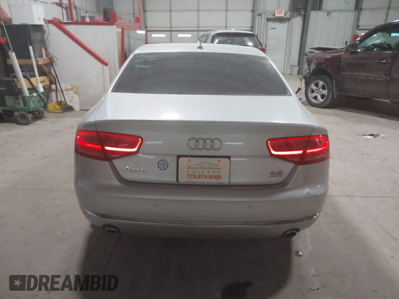2011 Audi A8 with VIN WAURVAFD5BN014214, listed as a IAAI auction lot 41396044 with 131,764 mi miles and . Bid and sale history available at DreamBid. Image 17.