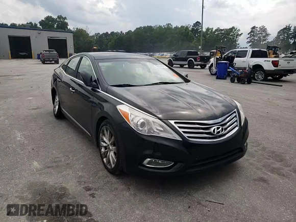 2013 Hyundai Azera with VIN KMHFH4JGXDA198345, listed as a Copart auction lot 58256945 with 102,711 mi miles and Salvage title. Bid and sale history available at DreamBid. Image 13.
