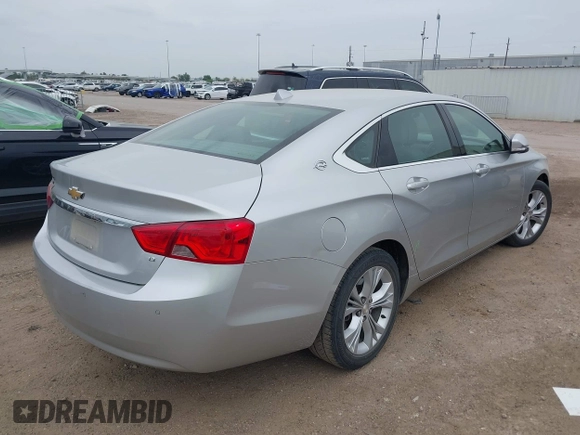 2014 Chevrolet Impala LT with VIN 2G1125S33E9101056, listed as a IAAI auction lot 41877161 with 130,757 mi miles and . Bid and sale history available at DreamBid. Image 4.