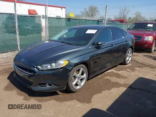 2015 Ford Fusion SE with VIN 3FA6P0H78FR299257, listed as a IAAI auction lot 42104541 with 122,986 mi miles. Bid and sale history available at carsss.com. Image 2.