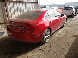 2016 Mazda Mazda6 i Touring with VIN JM1GJ1V58G1425881, listed as a IAAI auction lot 41786149 with 114,638 mi miles. Bid and sale history available at carsss.com. Image 4.